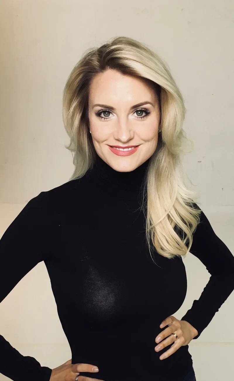 Jaimee Tuft headshot in a black turtleneck